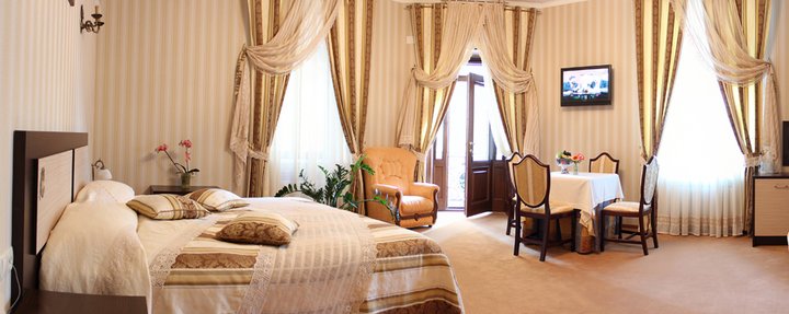 Luxury room at the Cleopatra Hotel in Kamenets-Podolsky. Book with a discount