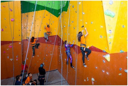 Climbing wall in the Hyperion active recreation center. Relax at a discount